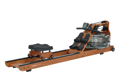 Brown wooden fluid rower with black footrest and seat, water tank resistance mechanism, on white background