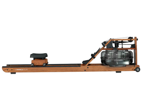 Brown wooden fluid rower with black footrest and seat, water tank resistance mechanism, on white background