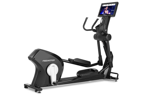 Freemotion e22.9 black elliptical machine with interactive touchscreen display and dual handlebar grips on white background
