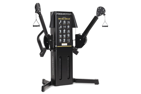 Freemotion Genesis dual cable cross lite machine with black frame, dual adjustable arms with handles, and instruction chart o