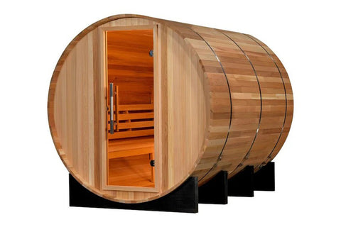 Wooden barrel sauna with natural cedar exterior, open glass door revealing orange-tinted interior with wooden benches and met