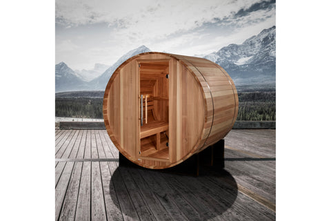 Golden Designs St. Moritz barrel sauna with cedar wood construction, open door showing interior benches, on black support fra
