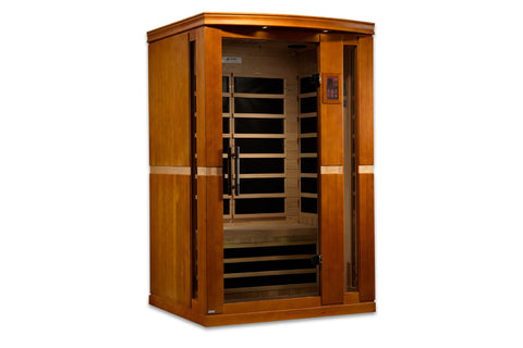 Golden Designs Vittoria 2-person infrared sauna with honey-colored wood exterior, glass door, and wooden bench seating inside