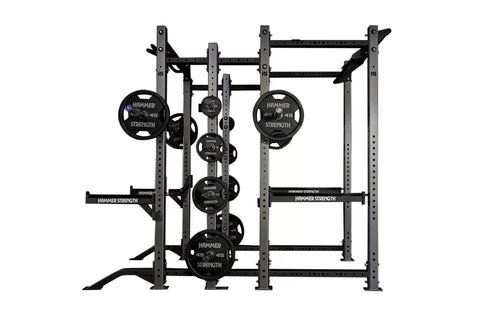 Hammer Strength HD Athletic NX Power Half Combo Rack with black weight plates and steel frame on black background