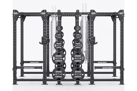 Hammer Strength HD Elite ID Combo Rack with black steel frame, weight plates, and silver chains on white background