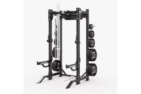 Black Hammer Strength HD Elite ID half rack with adjustable weight plate storage, chain attachment, and barbell on white back