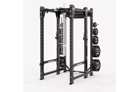 Black power rack with perforated uprights, adjustable safety bars, cable machine attachment on center post, and weight plate 
