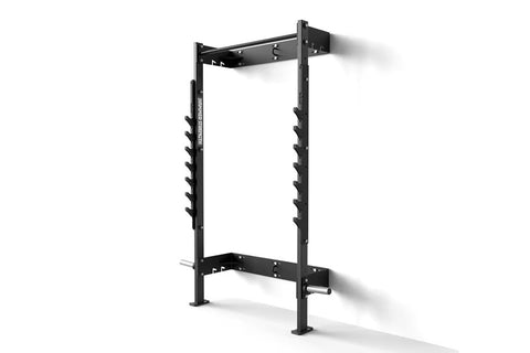 Black metal squat rack with horizontal bar and tiered weight plate storage pegs on vertical uprights, mounted on white backgr