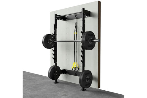 Black metal squat rack with horizontal bar and tiered weight plate storage pegs on vertical uprights, mounted on white backgr