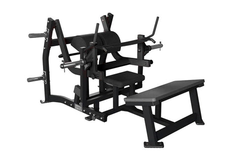 Black plate-loaded glute drive machine with padded seat and backrest, multiple weight plate pegs, and handlebar grips on whit