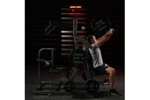 Black Hammer Strength plate-loaded chest and back exercise machine with dual weight stacks, padded seat and backrest, on whit