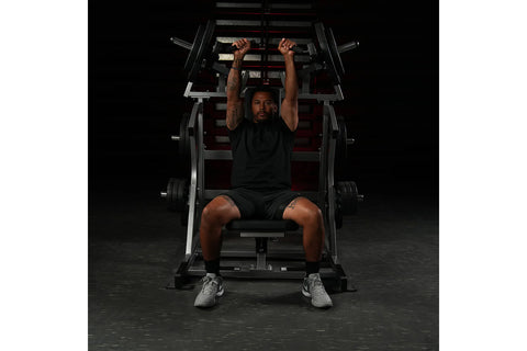 Black plate-loaded iso-lateral super incline press with dual weight stack arms, padded backrest, and adjustable handles on wh