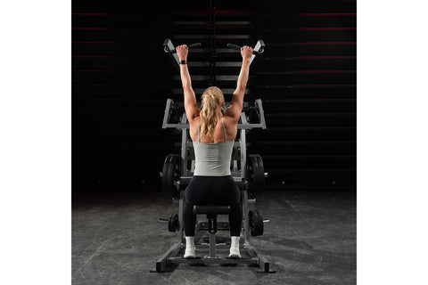 Hammer Strength black plate-loaded iso-lateral wide pulldown machine with dual handles and weight plate attachment, on white 