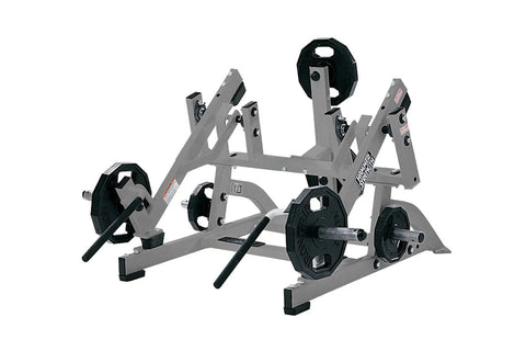 Hammer Strength plate-loaded squat high pull machine with gray steel frame, black handles, and weight plate pegs, on white ba