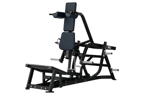 Black plate-loaded V-squat machine with padded seat and backrest, adjustable arm supports, and metal frame on white backgroun