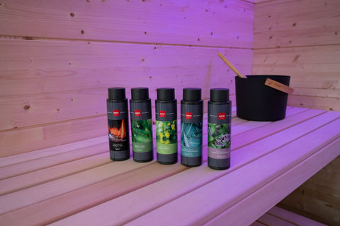 Harvia peppermint sauna scent bottle with purple label and black cap on white background