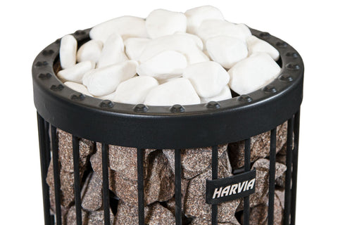 Harvia sauna heater bucket with white rounded stones and black metal rim studded design on white background