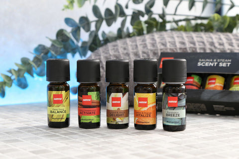 Harvia sauna and steam scent set with five 10ml bottles in black box packaging, featuring Coconut & Vanilla Delight, Spicy Pe