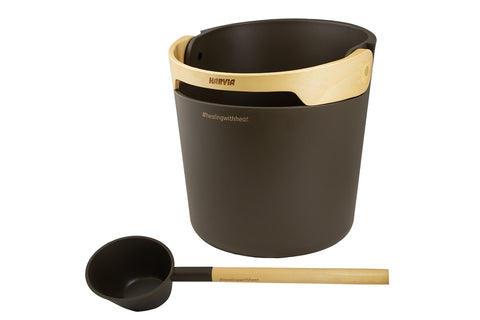 Harvia Helmi sauna ladle with chocolate brown rounded bowl and natural wood handle on white background