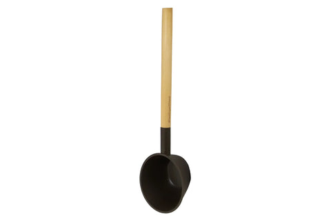 Harvia Helmi sauna ladle with chocolate brown rounded bowl and natural wood handle on white background