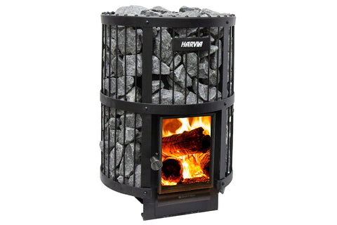 Harvia Legend 240 cylindrical black wood-burning sauna stove with lit fire visible through glass door and gray soapstone exte