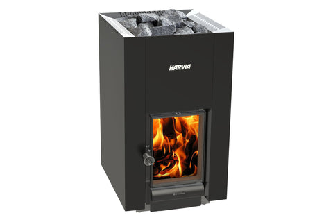 Harvia Linear 22 black wood-burning sauna stove with gray stones on top and visible flames in glass door window