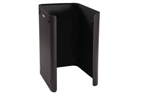 Black metal protective sheath for sauna stove with curved sides and rounded legs on white background