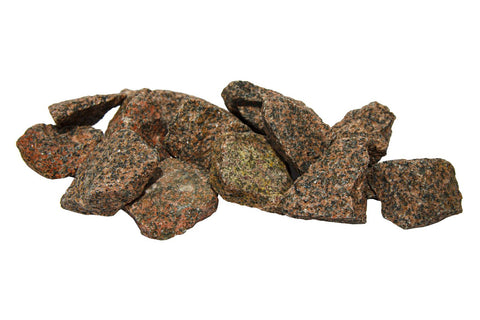 Red granite sauna stones in natural earth tones with lichen patterns, displayed on white background