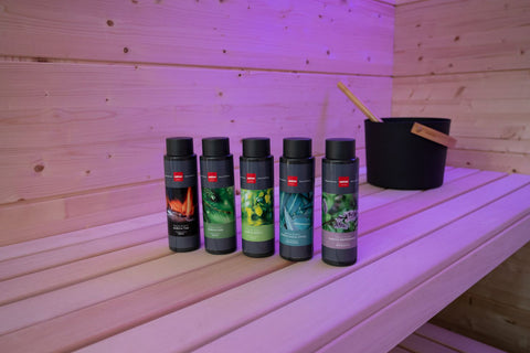 Harvia eucalyptus sauna scent bottle with black cap and dark blue label featuring eucalyptus leaf imagery on white background