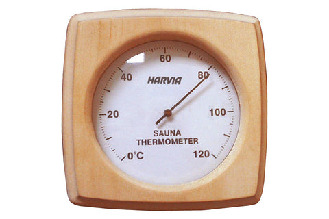 Harvia sauna thermometer with wooden frame, white dial face, and temperature scale from 0 to 120 degrees Celsius on white bac