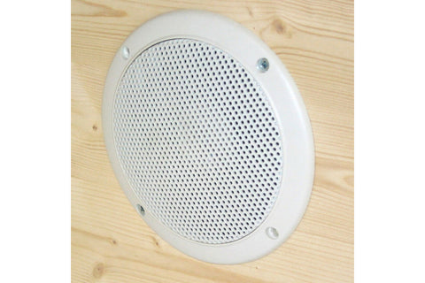 White round sauna wall loudspeaker with perforated metal grille and mounting screws, on white background