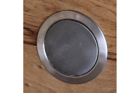 Harvia sauna wall loudspeaker with brushed stainless steel rim and black perforated metal grille on white background