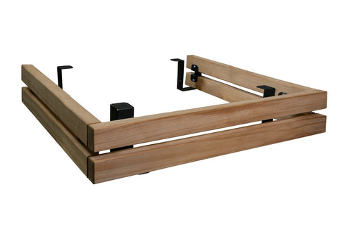 Natural wood sauna railing with black metal brackets and supports on white background