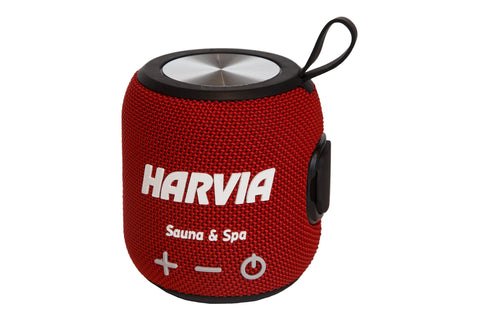 Red fabric Harvia sauna speaker with black accents, metallic top, control buttons, and carrying loop on white background