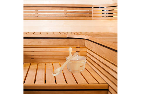 Natural wooden sauna ladle with long curved handle and shallow bowl, cream rope loop attached to handle, on white background