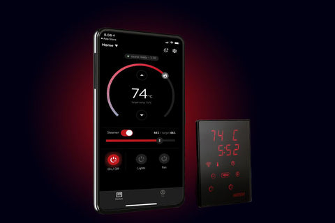 Harvia Xenio smartphone app displaying sauna controls with 74°C temperature gauge, steamer toggle, and lighting and fan butto