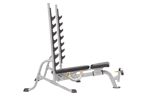 Hoist 7-position Olympic bench press with silver metal frame, black padded seat and backrest, and loaded barbell bar on white