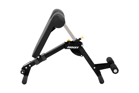 Black and gray Hoist ab/back hyper bench with padded seat, adjustable backrest, and foot platform on white background