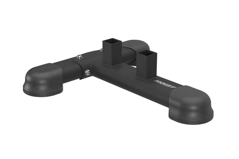 Black metal hoist attachment stand with curved pipe ends, central mounting bracket, and square support posts on white backgro