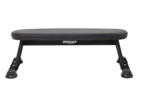 Black flat utility bench with padded grey vinyl seat, black metal frame, and suction cup feet on white background