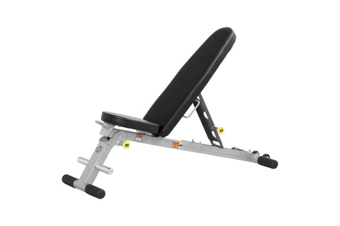Hoist Folding Multi-Bench with black padded backrest and seat, silver metal frame, yellow safety labels, and black foot pads 