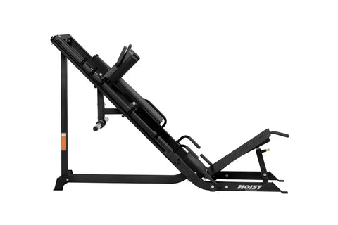 Black Hoist leg press and hack squat combination machine with padded seat, foot platform, and vertical frame on white backgro