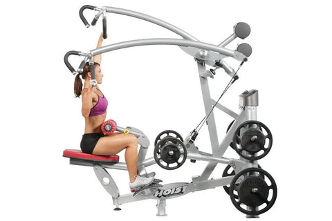 Hoist ROC-IT silver and black lat pulldown machine with weight plates, foot pedal, and handlebar attachment on white backgrou