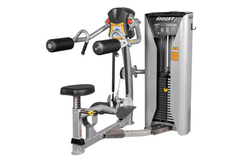 Hoist ROC-IT Lateral Raise Machine with silver frame, black seat, dual black cylinders, and orange accents on white backgroun
