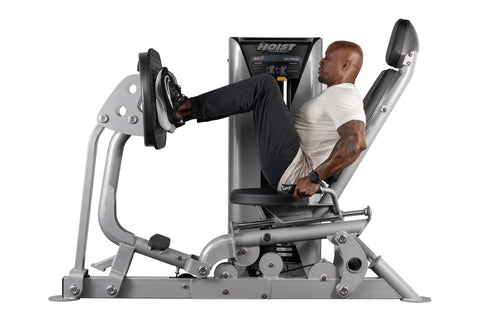 Hoist ROC-IT leg press machine with gray padded seat and backrest, black and silver frame, control panel with yellow accents,