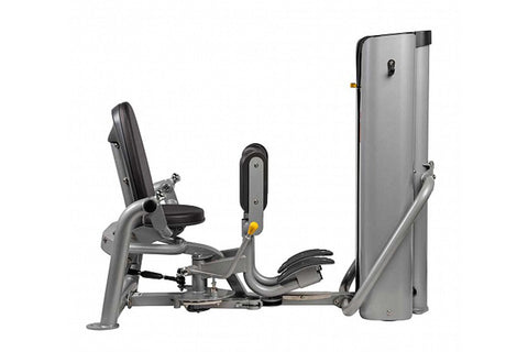 Hoist ROC-IT outer thigh machine with gray frame, black padded seat and leg press, control panel with orange accents on tall 