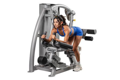 Hoist ROC-IT Glute Master Machine with silver frame, black foot platform, and adjustable arm levers on white background