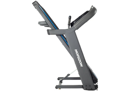 Black Horizon 7.4 AT treadmill with digital display console, cushioned running deck, and handlebar controls on white backgrou