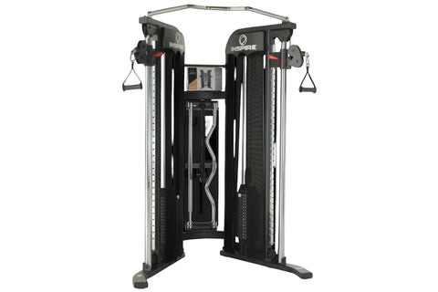 Inspire Fitness FT1 Functional Trainer with black uprights, silver frame, dual cable stations with handles, and adjustment di