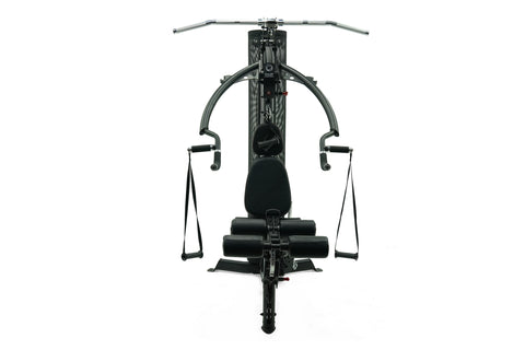 Black and navy Inspire Fitness M2 multi-gym system with cable machine, seat, and leg press attachment on white background